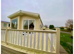 Used single lodge for sale with decking and free 2023 sitefees included in Skegness, Lincolnshire