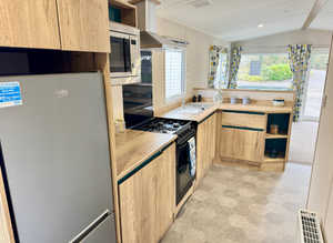 **Brand new caravan with sliding patio door just off A12**
