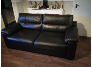 Black leather sofa and matching chair