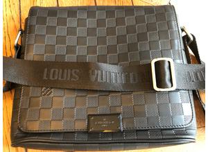 Louis Vuitton strap bag