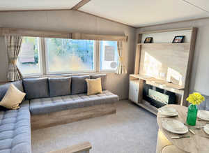 **Brand new caravan just off a12 on a park with fishing lakes and outdoor pool**