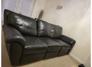Three seater leather reclining sofa