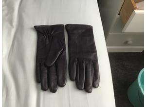 New beautiful purple soft leather gloves
