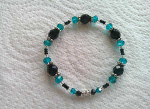 Handmade Black & Emerald Green Glass Bead Elasticated Bracelet.