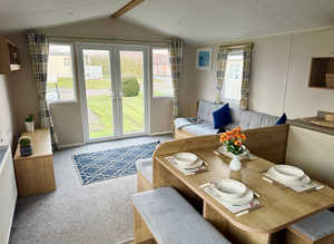 **Caravan with patio doors & walk-in wardrobe cheap**