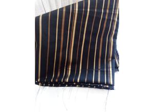 Blk/gold striped silk fabric.