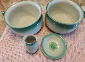 Antique wash set including 2 potties, large bowl and jug. soap dish and small.jug.