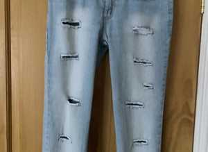 Ladies/teens three quarter ripped jeans