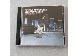 2 Disc Rock compilation: While My Guitar Gently Weeps.  36 Tracks.