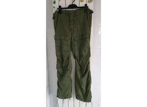 A Pair of Ex-x Forces Green Cargo Trousers Size: Small.
