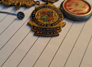 Vintage badges and pin