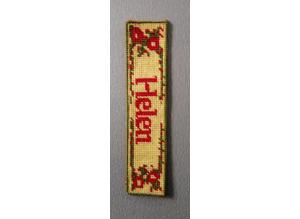 A Personalised Tapestry Bookmark with the name Helen.