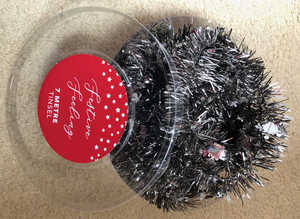 New 7 metre silver tinsel.