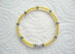 Handmade Yellow Glass Seed Bead Elasticated Bracelet.