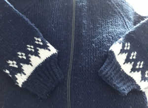 Hand knitted cardigan with hood
