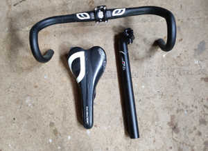 Handle bars . Seat  and stem. Most