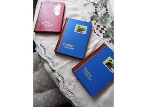3 stamp albums with stamps