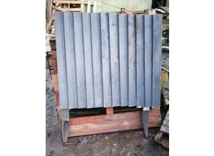 Fence panel with metal stakes