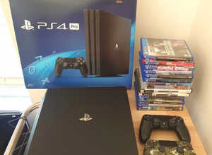 Sony PlayStation 4 Pro 1TB + 10 Games + 2 Controllers