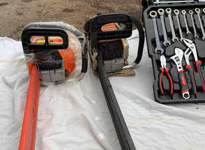 Large case on wheels containing tools, brand-new never used also chainsaw